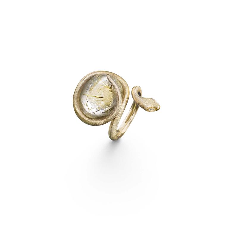 Ole Lynggaard yellow gold ring, set with a rutilated quartz and four diamonds for eyes.
