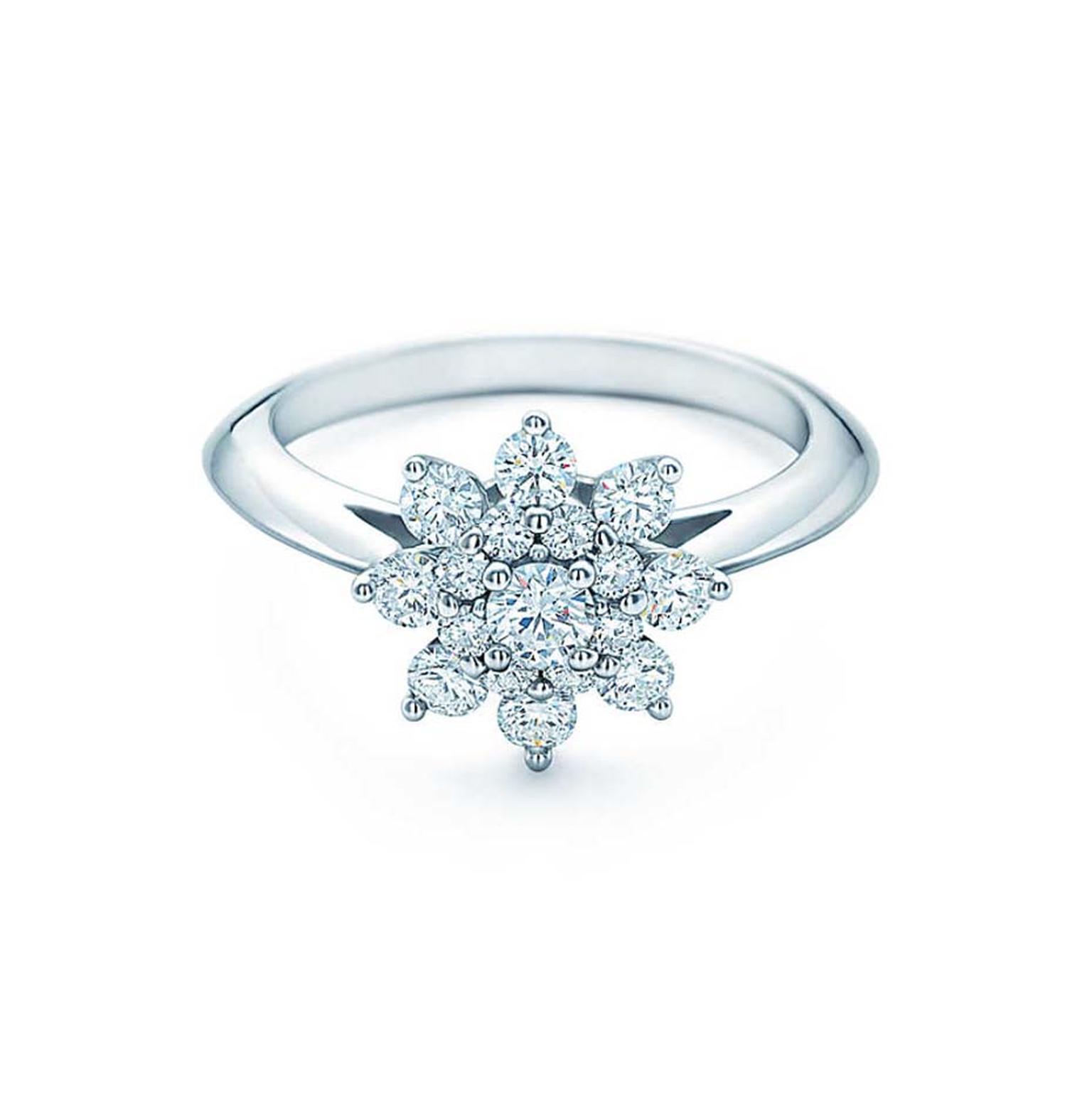Tiffany & Co. Flower engagement ring, with petals of round brilliant diamonds surrounding a centre diamond.