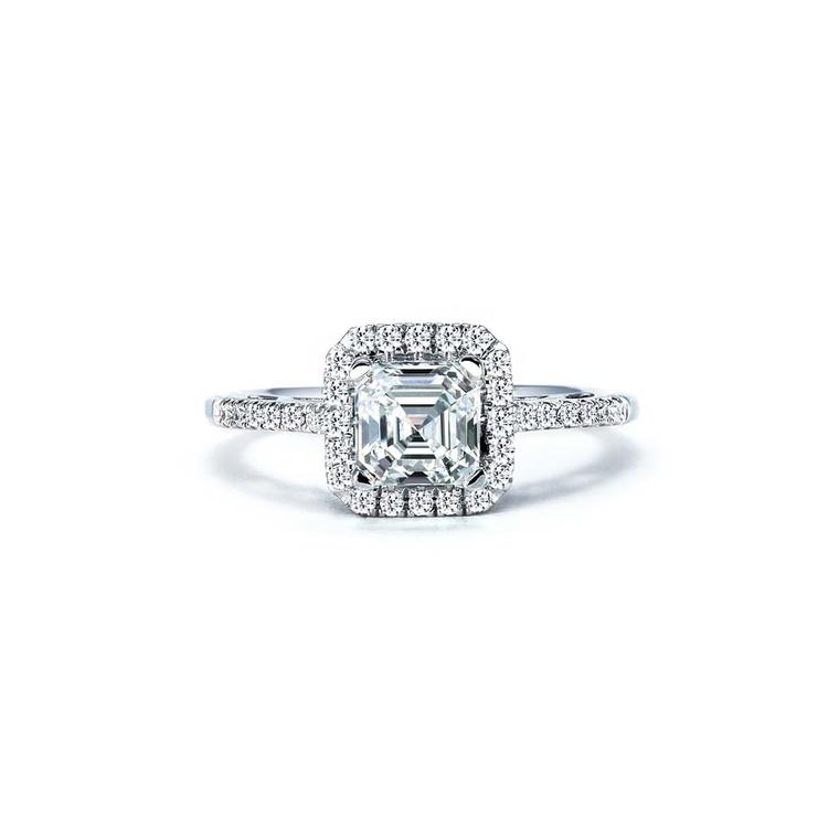 Royal Asscher cut diamond engagement ring in white gold with a diamond halo surround. Also available in platinum and yellow gold.