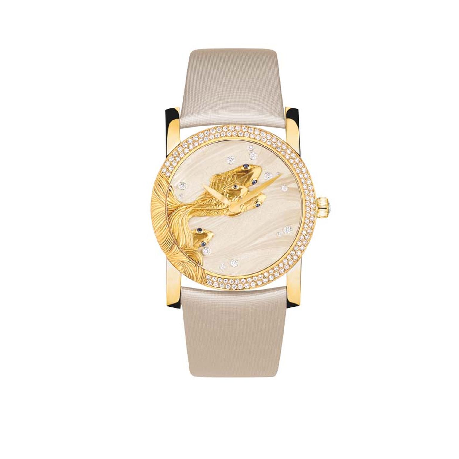 Chaumet watches included this fish-inspired dial in its Lumières d'Eau high jewellery collection. The 35mm yellow gold case with its diamond-set bezel comes to life as a shoal of hand-sculpted gold carp dart across the waves engraved on the white lacquer.