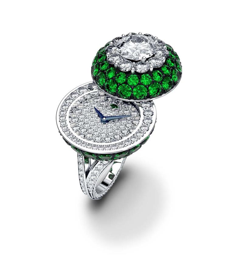 Graff Halo Secret Ring in white gold with diamonds and emeralds.