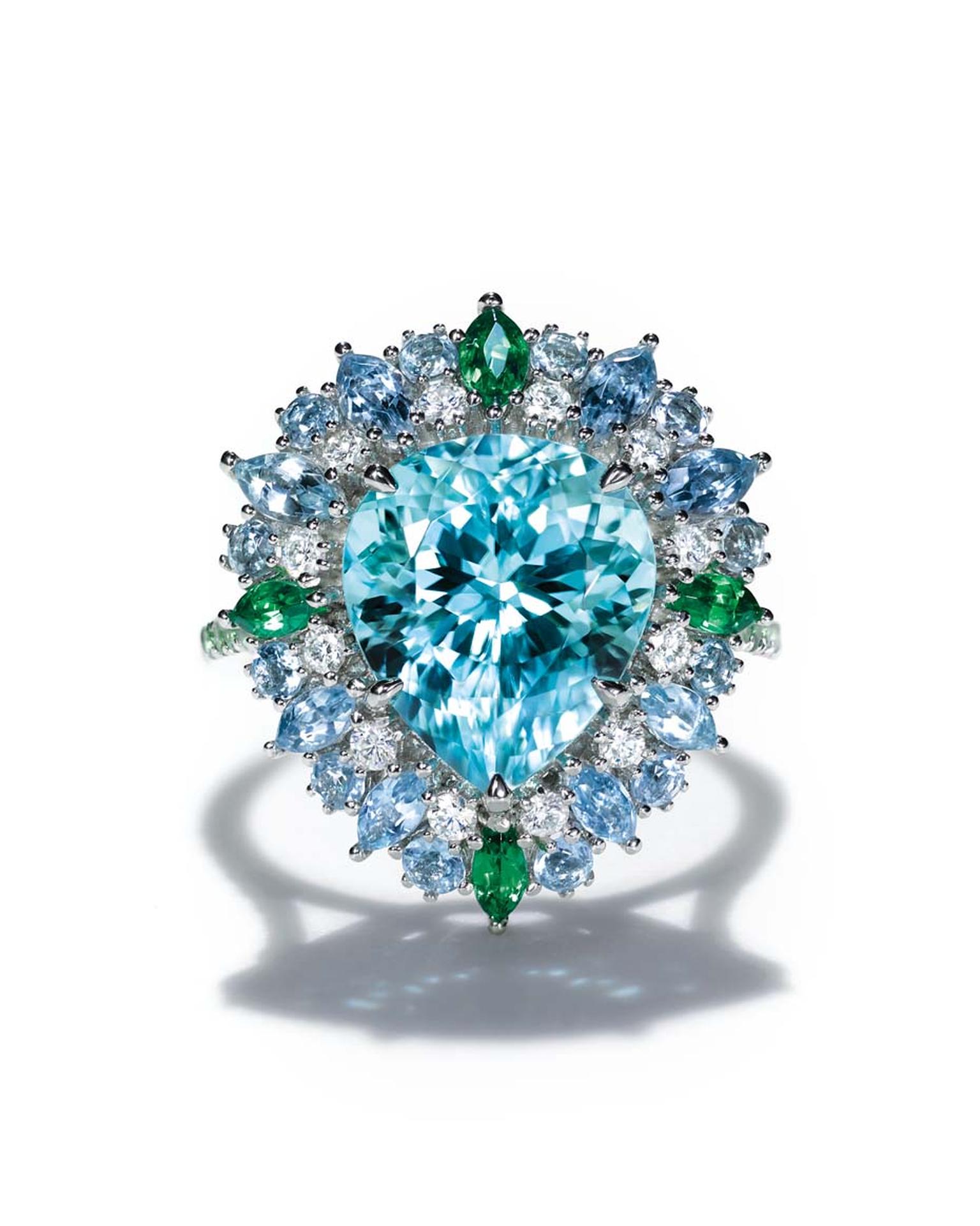 Tiffany ring set with a central 4.42ctt pear-shaped blue cuprian elbaite tourmaline surrounded by aquamarines, tsavorites and diamonds in platinum. From the 2015 Blue Book collection.
