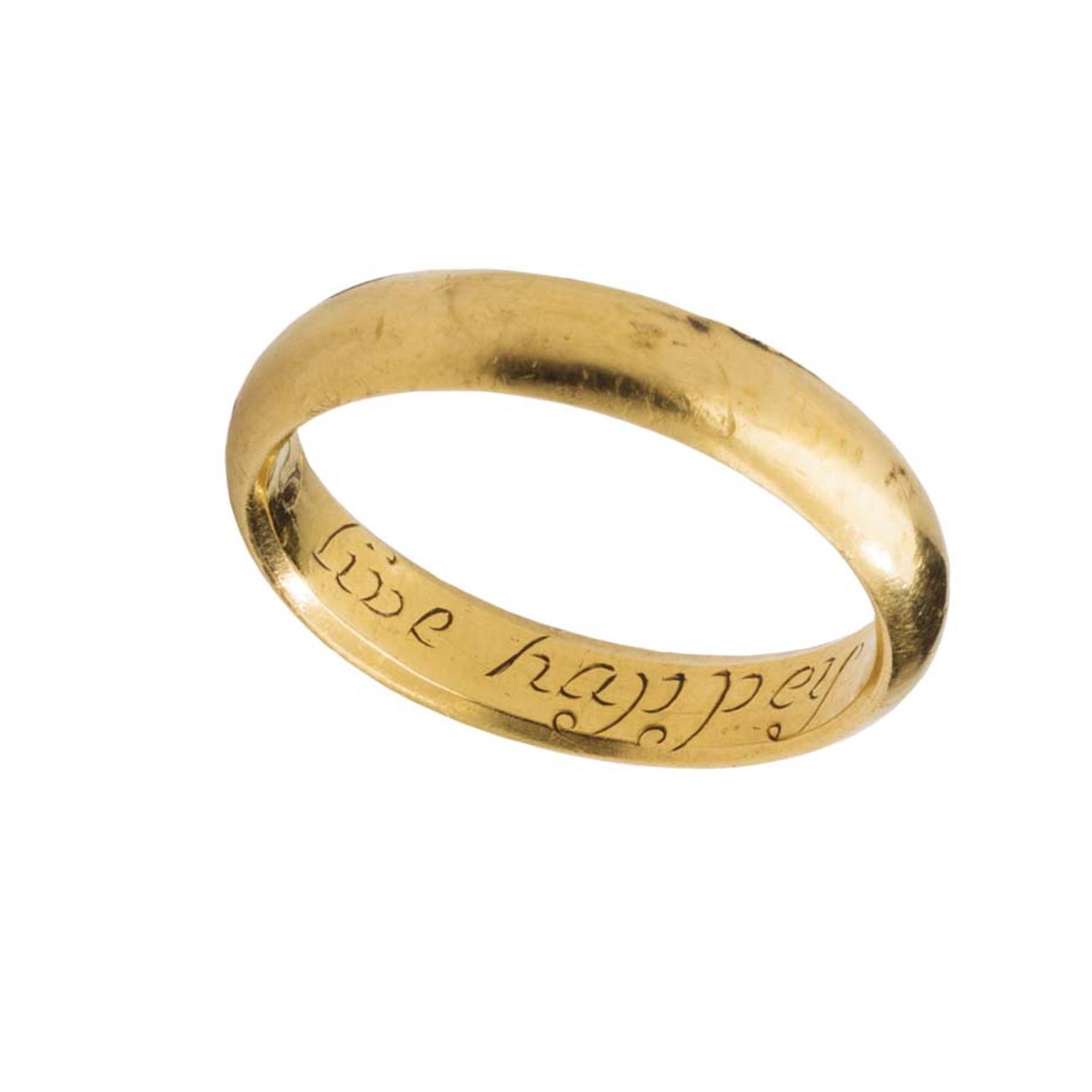 17th century gold posy ring inscribed with the words "Love and Live Happy".