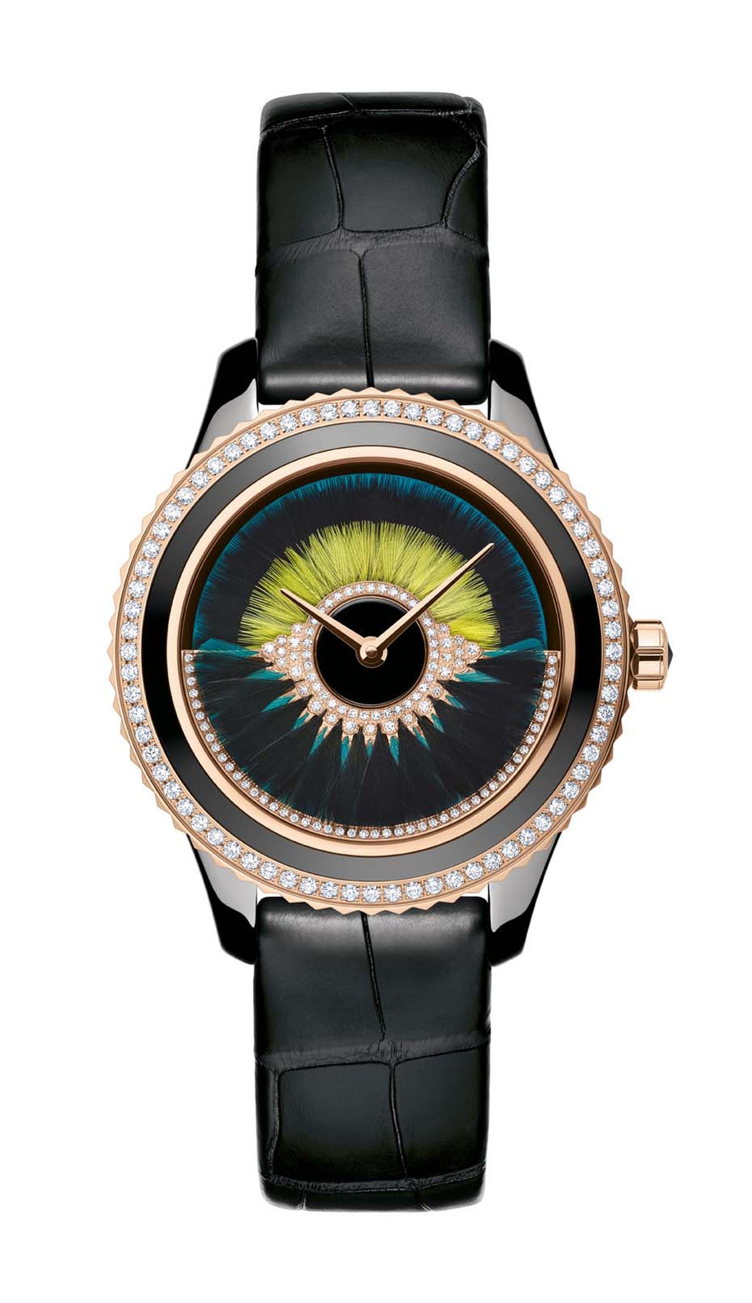 Dior VIII Grand Bal Cancan watch in a 38mm pink gold and black ceramic case with a peacock blue lacquered dial decorated with two rows of black and yellow feather marquetry. The oscillating weight on the dial swirls with peacock blue and black feathers an