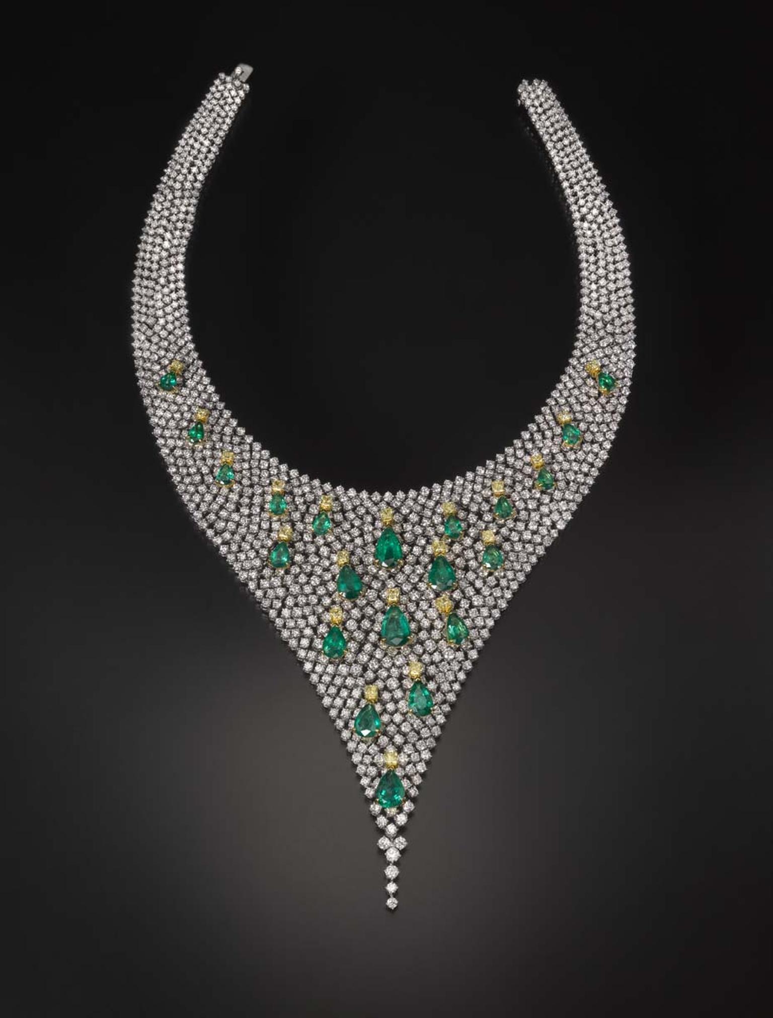 Emerald, yellow diamond and white diamond Butani necklace, inspired by a Water Lily pond. The emeralds are set so that they resemble floating lily pads. The necklace and matching earrings are set with a total of 80ct of diamonds and 34ct of emeralds.