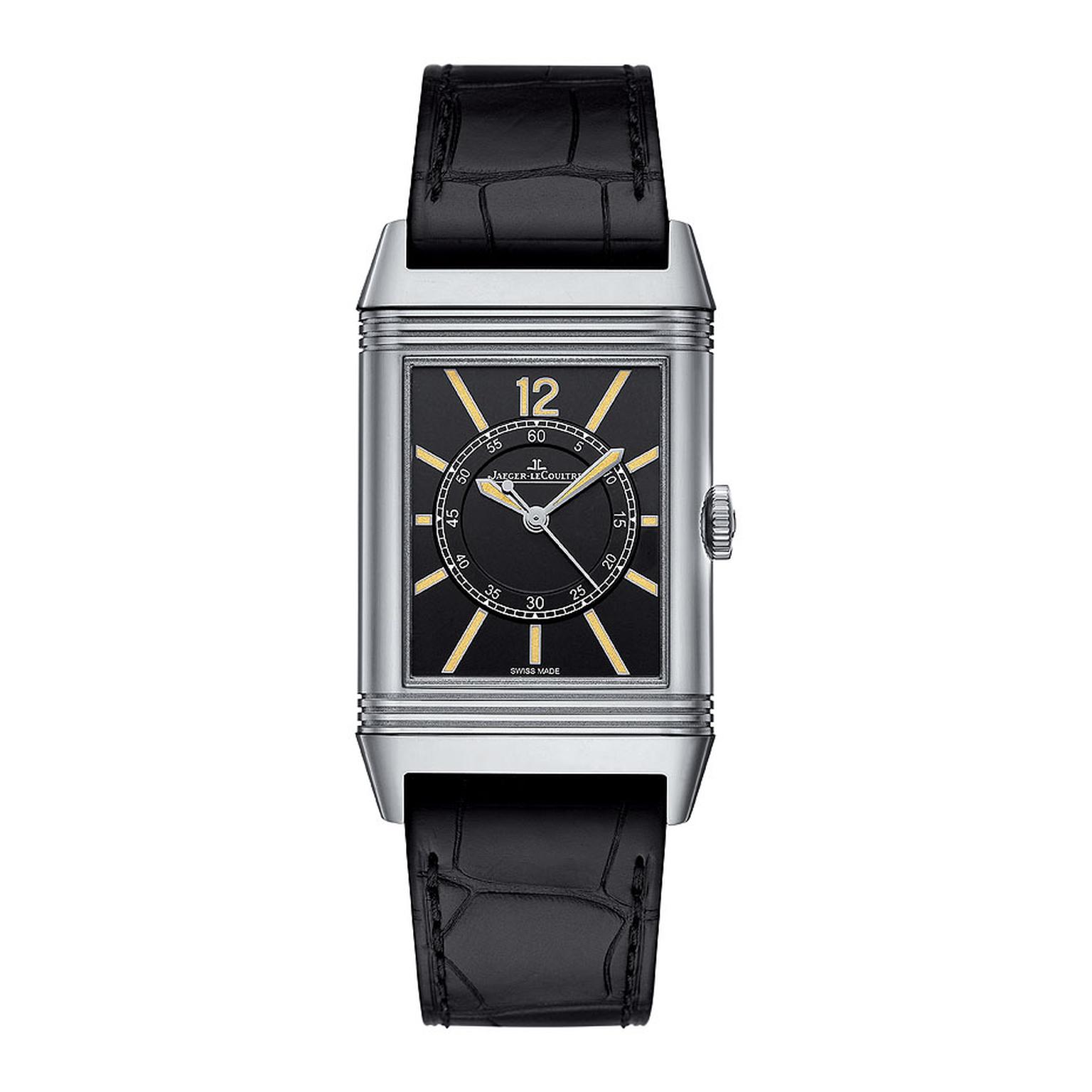 The limited Boutique Edition Jaeger-LeCoultre Grande Reverso 1931 Seconde Centrale watch features a 46.8 x 27.4mm white gold case and is presented on a black alligator strap with a white gold pin buckle. The black dial houses gold-powdered hour makers and