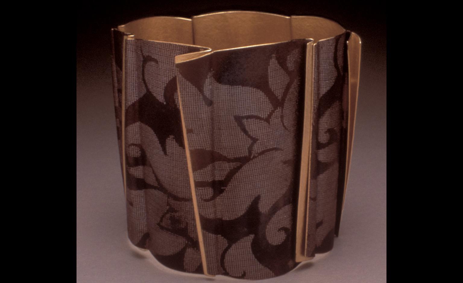 Jacqueline Mina 1993 18 carat gold, part-oxidised with platinum mesh fusion inlay. Photo: Joel Degen