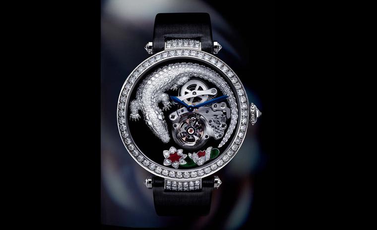 Cartier's Crocodile tourbillon watch in white gold with diamonds. Crocodile motifs were first used at Cartier following a commission from the Mexican film diva María Félix for a crocodile necklace.