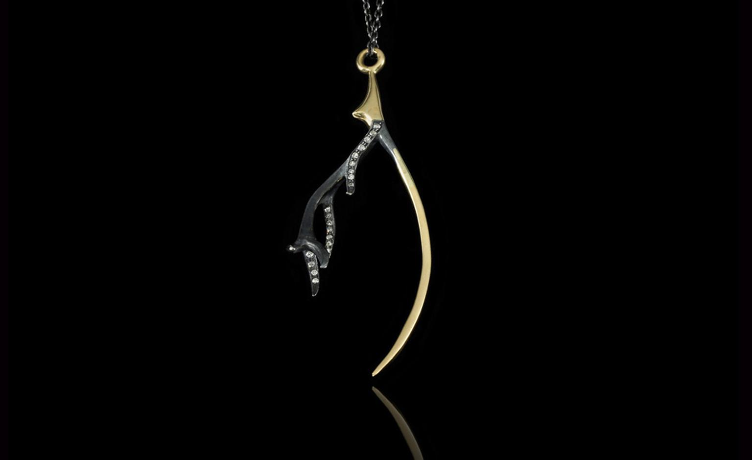 Jessica McCormack, 'Greed' diamond, 18k yellow gold and silver pendant, from the XIV collection. £2,500