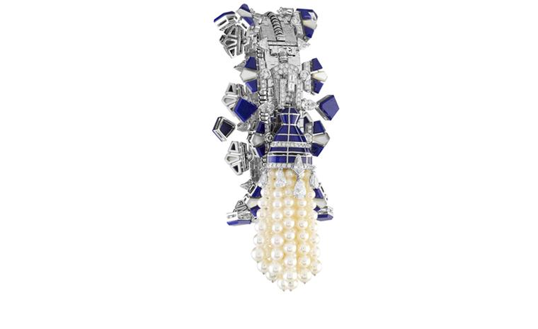 Van Cleef & Arpels Zip necklace in white gold set with diamonds, white cultured pearls, white mother-of-pearl and lapis lazuli.  Worn as a bracelet. POA