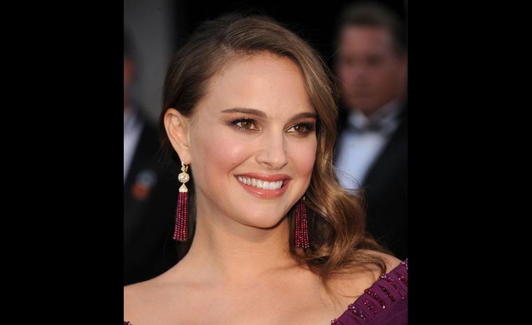 NATALIE PORTMAN, who won ‘Best Actress’ Oscar at the Academy awards for her role in Black Swan wears Tiffany rubellite tassel earrings on the red carpet.