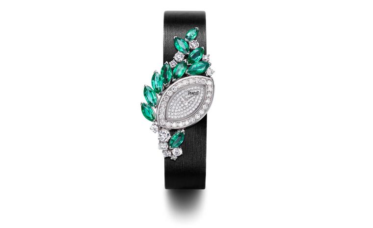 PIAGET, Limelight Garden Party, white gold case set with diamonds and emeralds, diamond paved dial set with diamonds. Piaget quartz movement, white gold folding clasp set with diamonds and black satin trap. POA