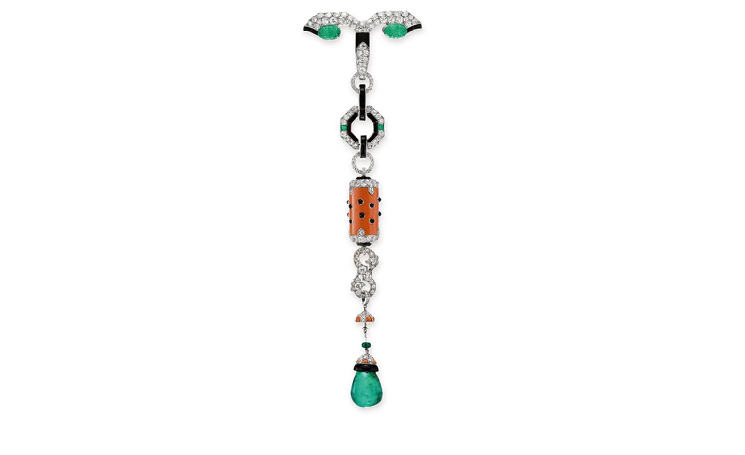 Lot 277, AN ART DECO DIAMOND, EMERALD, CORAL AND ONYX "PENDELOQUE" PENDANT BROOCH, BY CARTIER. Estimate $100,000 - 150,000 U.S. dollars. Christie's Images Ltd. SOLD FOR $158,500