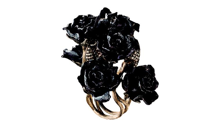H STERN, Rose Garden ring, the roses in Alice’s garden are now sculptured in Noble Gold, and thanks to the finish in enamel, gain a tone of dark purple, which contrasts with delicate buttons sprinkled with diamonds. £26,500