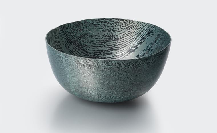 “Mokume Gane Bowl” by Alistair McCallum, 2010 Hand raised Mokume Gane bowl made from 128 layers of silver and gilding metal.