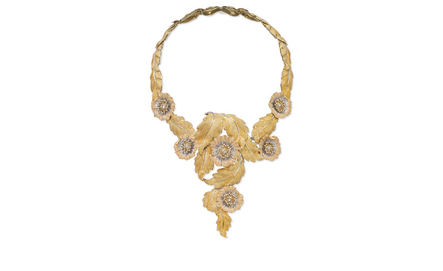 Lot 161. The 'Grand Collier Printemps', By Buccellati. Of V-shape design, with textured three colour gold leaves and flowerheads, each centering upon diamond-set pistils. Estimate  CHF 45,000 - CHF 55,000 SOLD FOR CHF 56,250