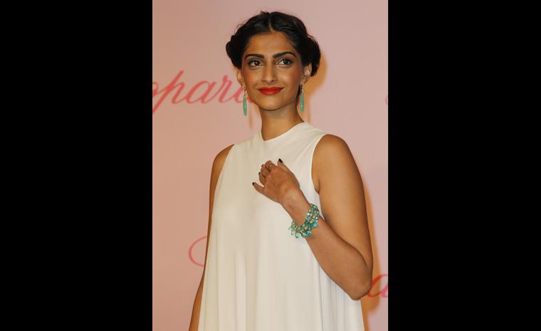 Sonam Kapoor at Chopard's Crazy Horse party at the Cannes Film Festival 2011 wearing Chopard jewels.