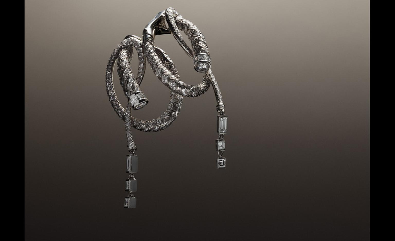 Hermès Fouet earrings in platinum with diamonds.