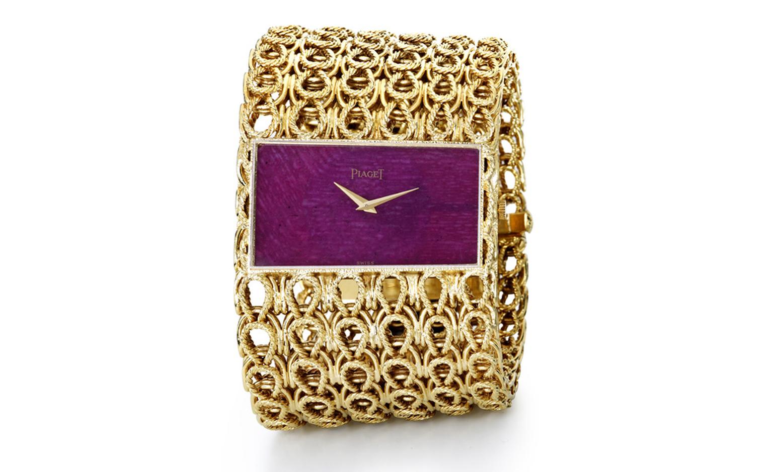 Piaget Cuff 1970 yellow gold cuff watch with ruby dial and Piaget ultra-thin mechanical movement 9P. Piaget Private Collection.