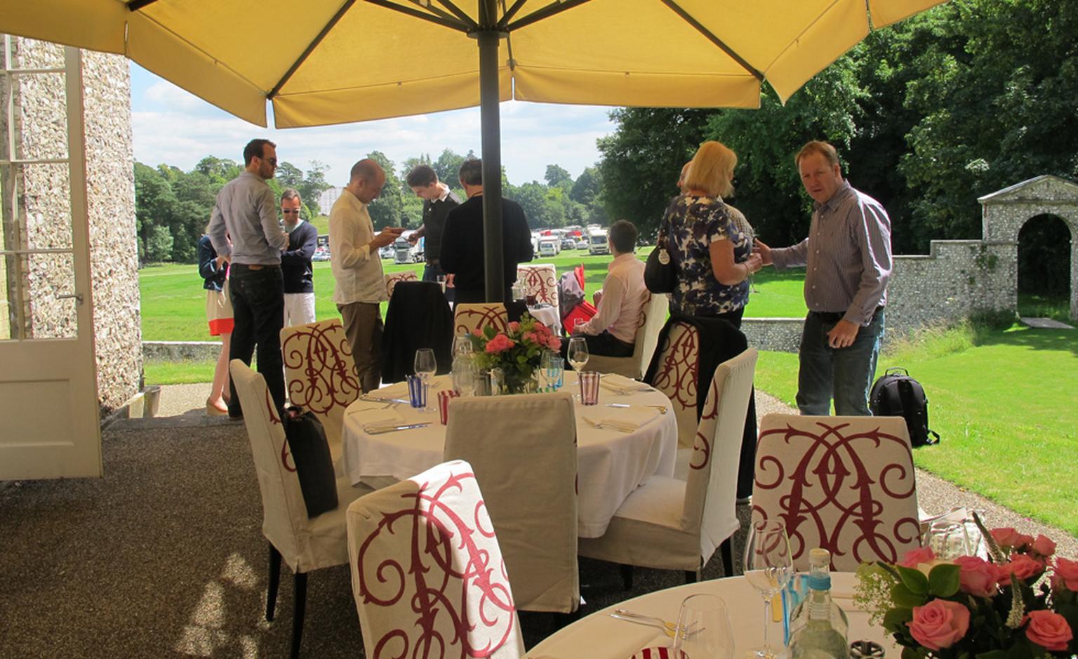 Lunch on the terrace at The Kennels, which is Goodwood-speak for the gold club. Bliss with a view and away from the car-mad crowds and the roar of engines.