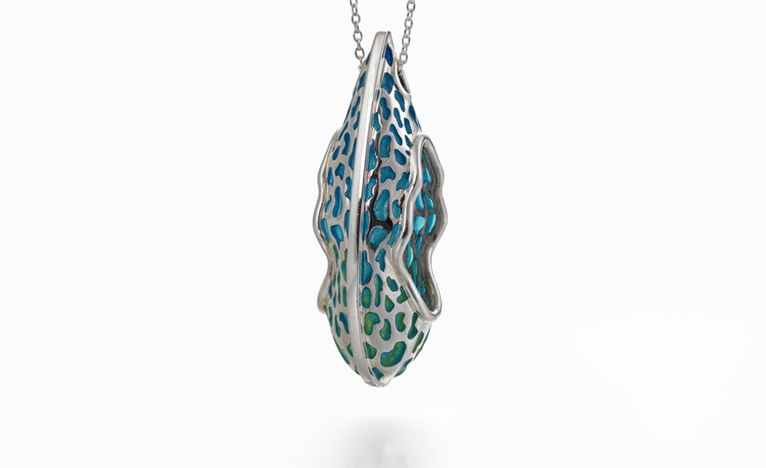 Teardrop shaped pendant with blue and green enamel and diamond set on the edge by Regina Aradesian. Price from £2400
