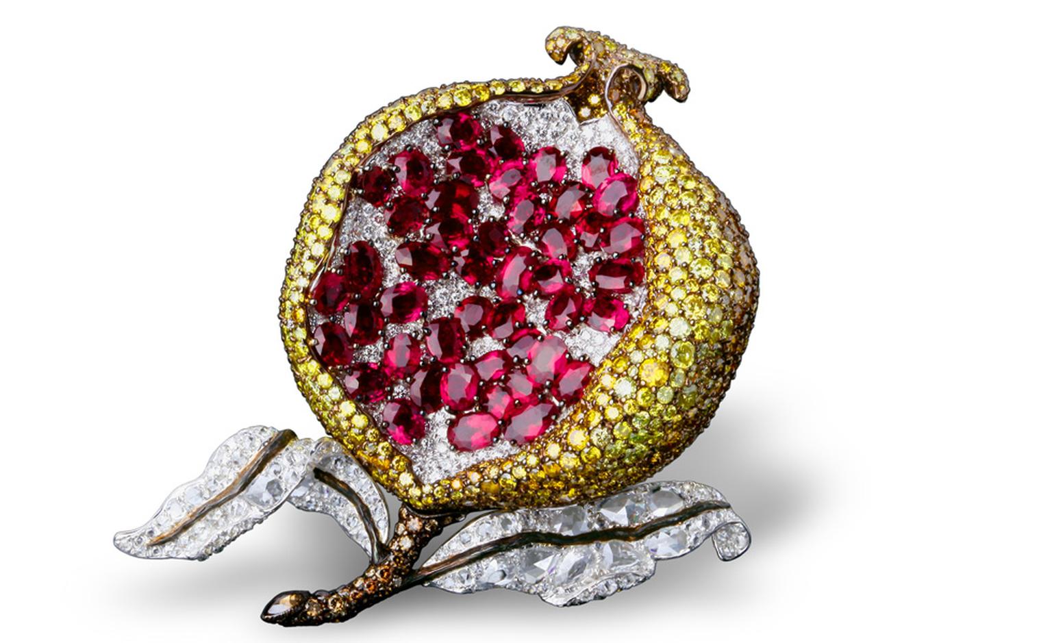 Pomegranate clip with white, fancy yellow and brown diamond in platinum and yellow gold.