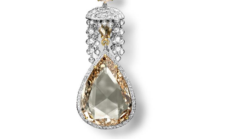 This close-up of the yellow diamond teardrop pendant how sophisticated is Carnet's use of diamond cutting techniques.