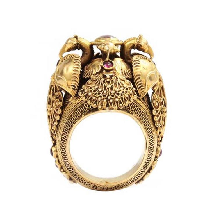 A vintage peacock ring worn by kings, in yellow gold and set with rubies, by C. Krishniah Chetty and Sons.