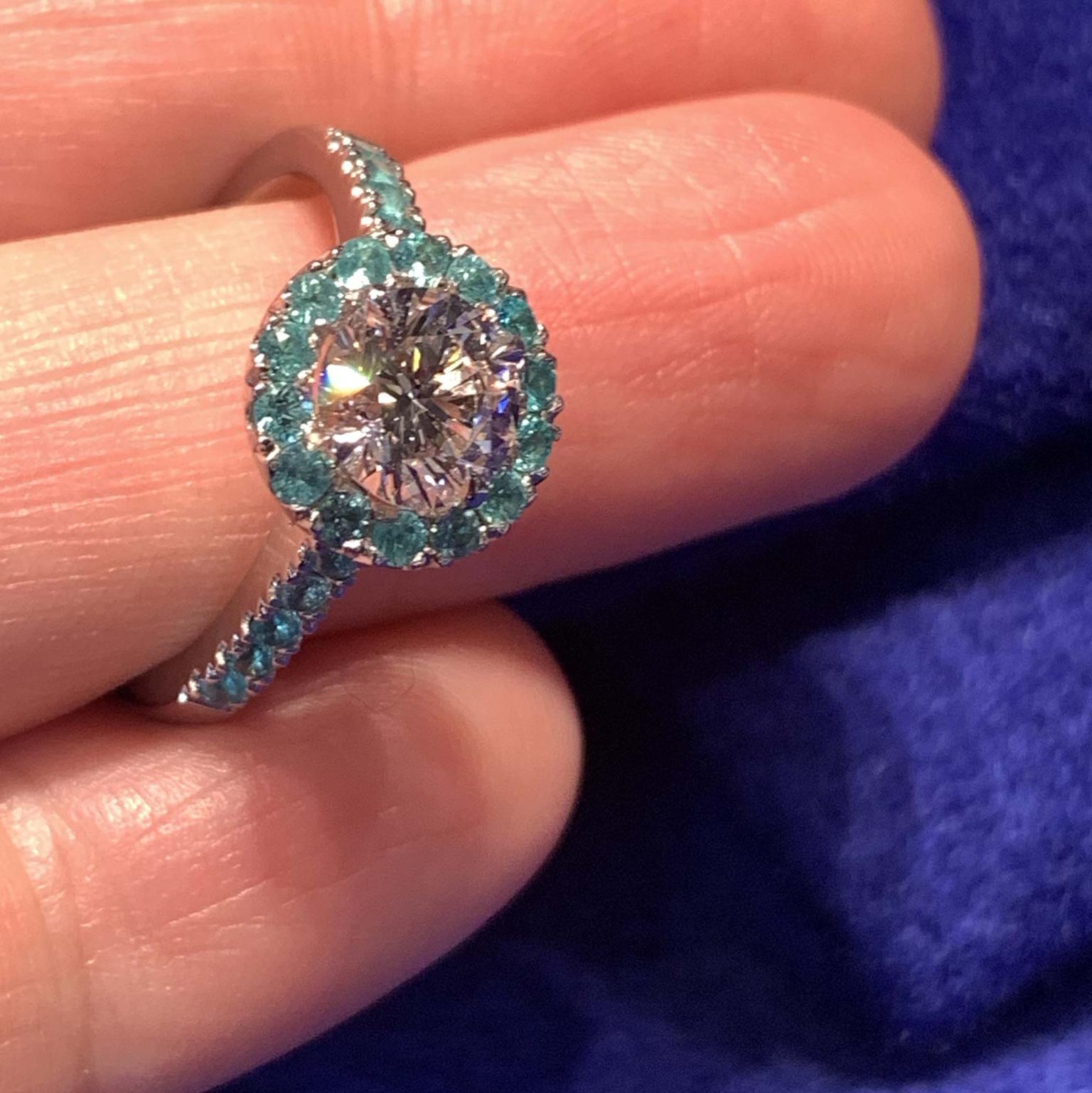 Hirsh diamond engagement ring with diamonds and Paraiba tourmaline