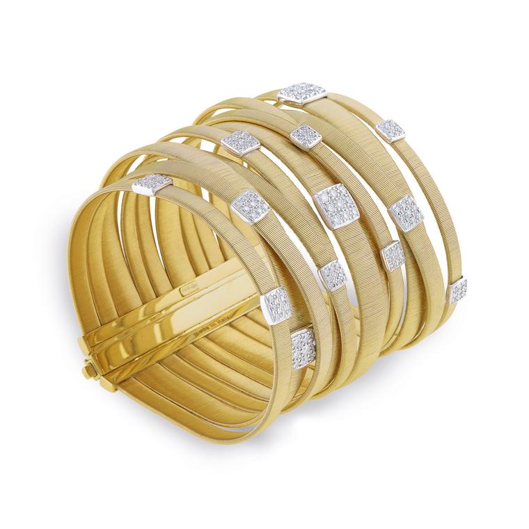 11 row yellow gold Masai bracelet with diamonds