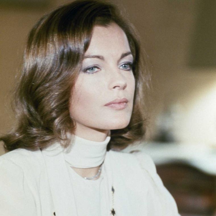 Romy Schneider in 1974 wearing Van Cleef Arpels Alhambra necklace