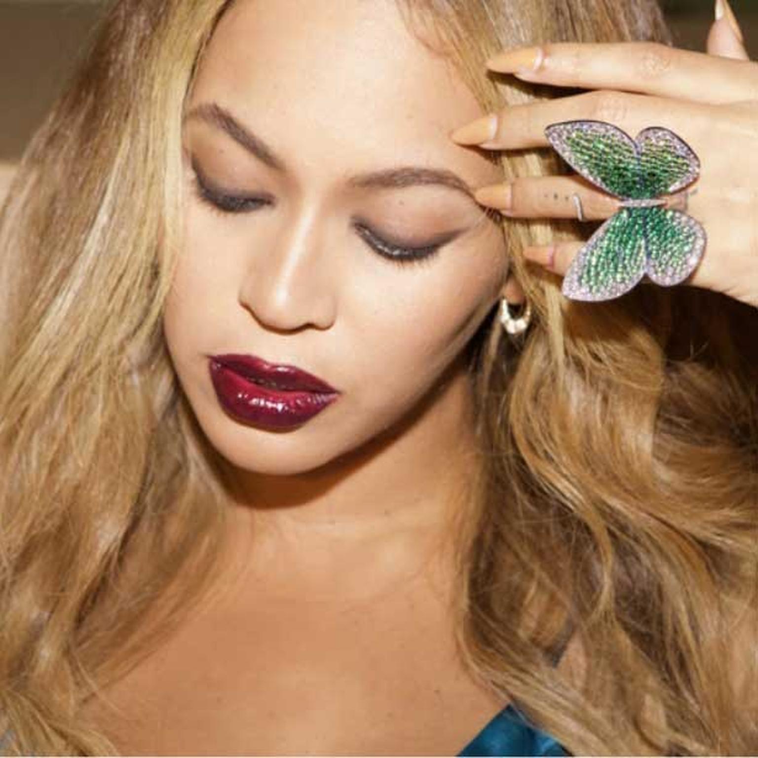 Beyonce wearing Papillon ring by Glenn Spiro in photo taken by Jay Z