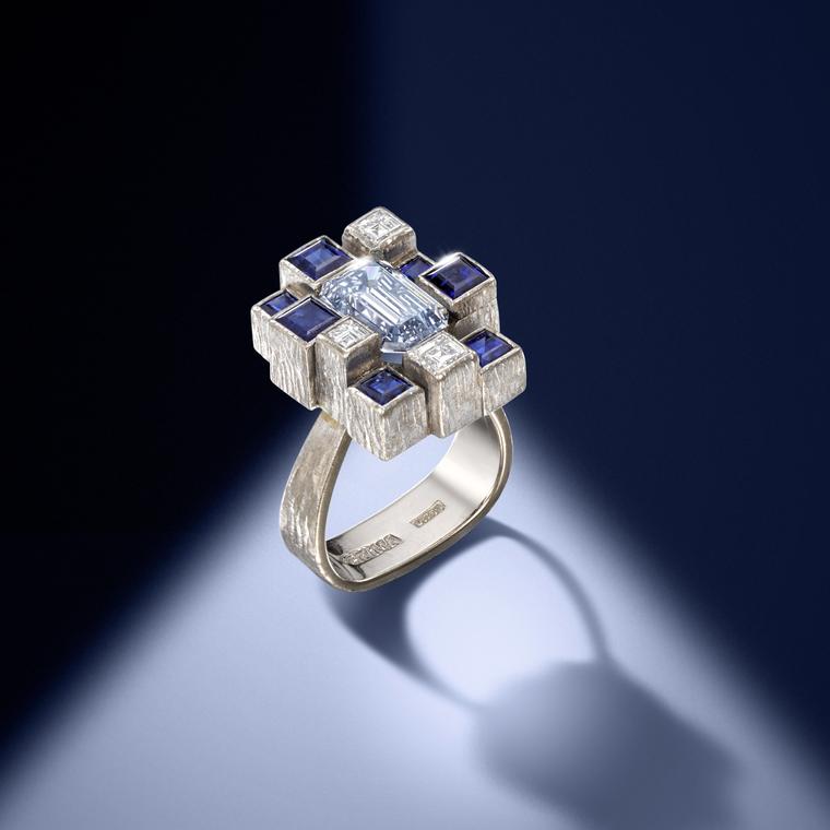 Andrew Grima white gold ring with a grey-blue diamond