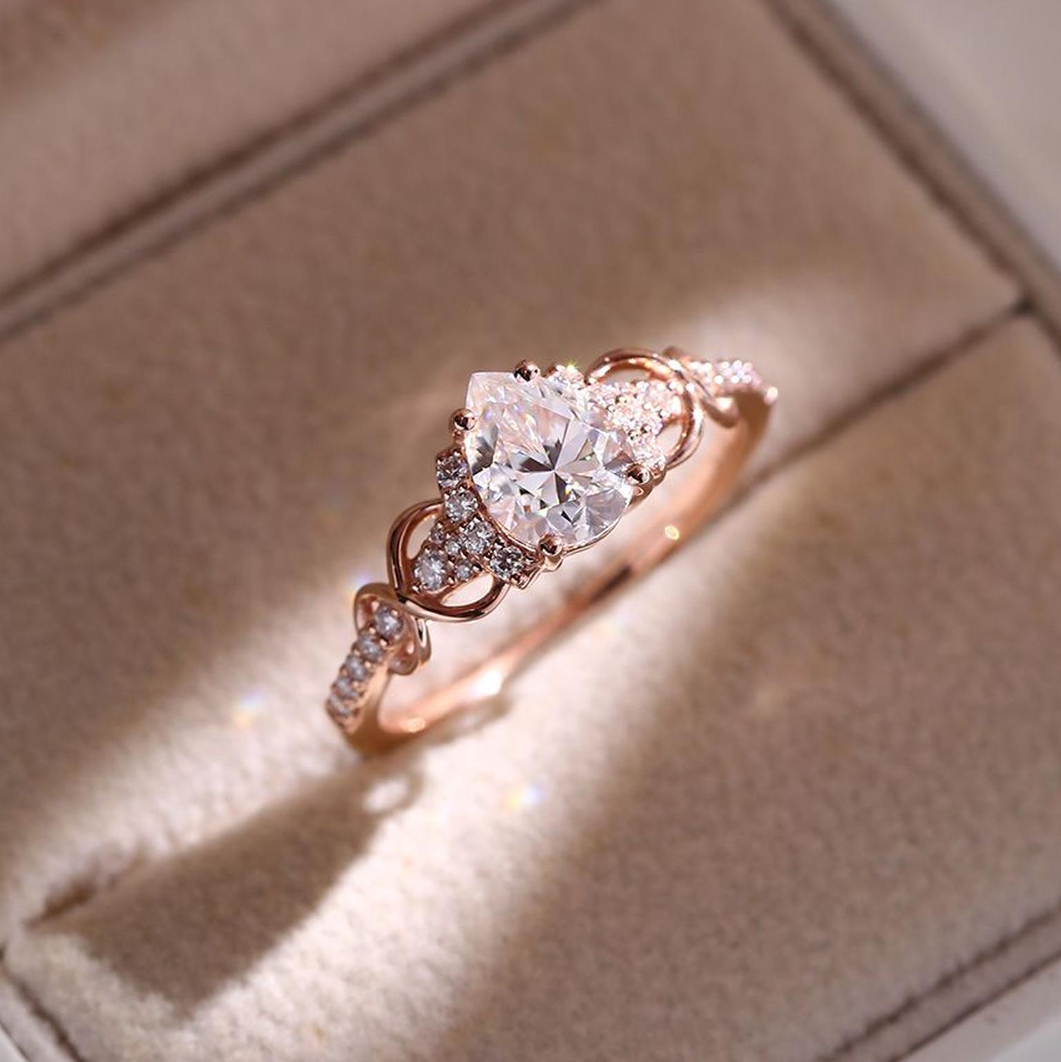 Pear moissanite ring by Molly Jewelry