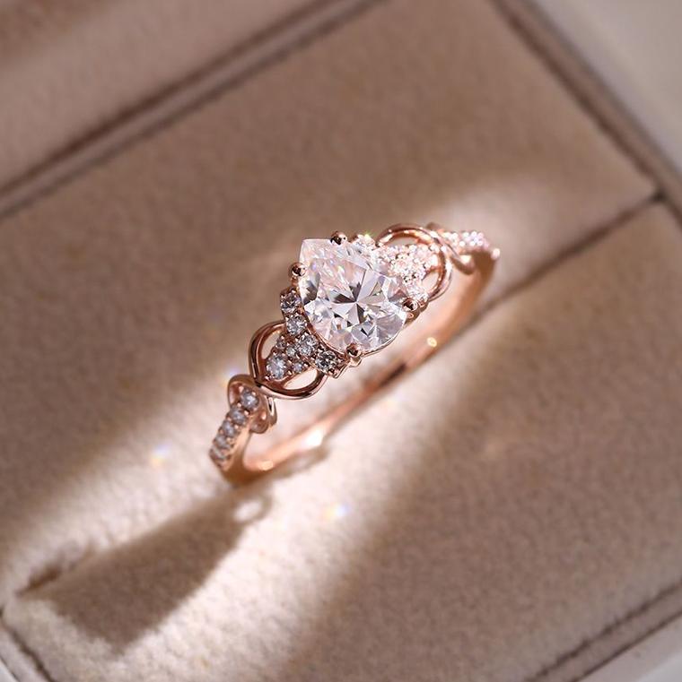 Pear moissanite ring by Molly Jewelry