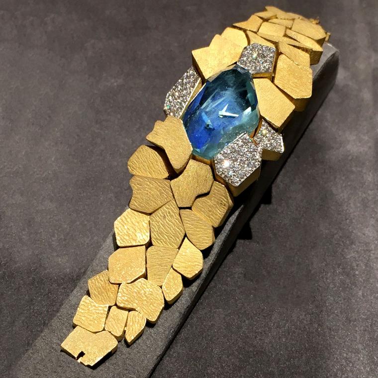 Andrew Grima 1969 Omega watch in gold with a blue topaz dial, seen at TEFAF 2017