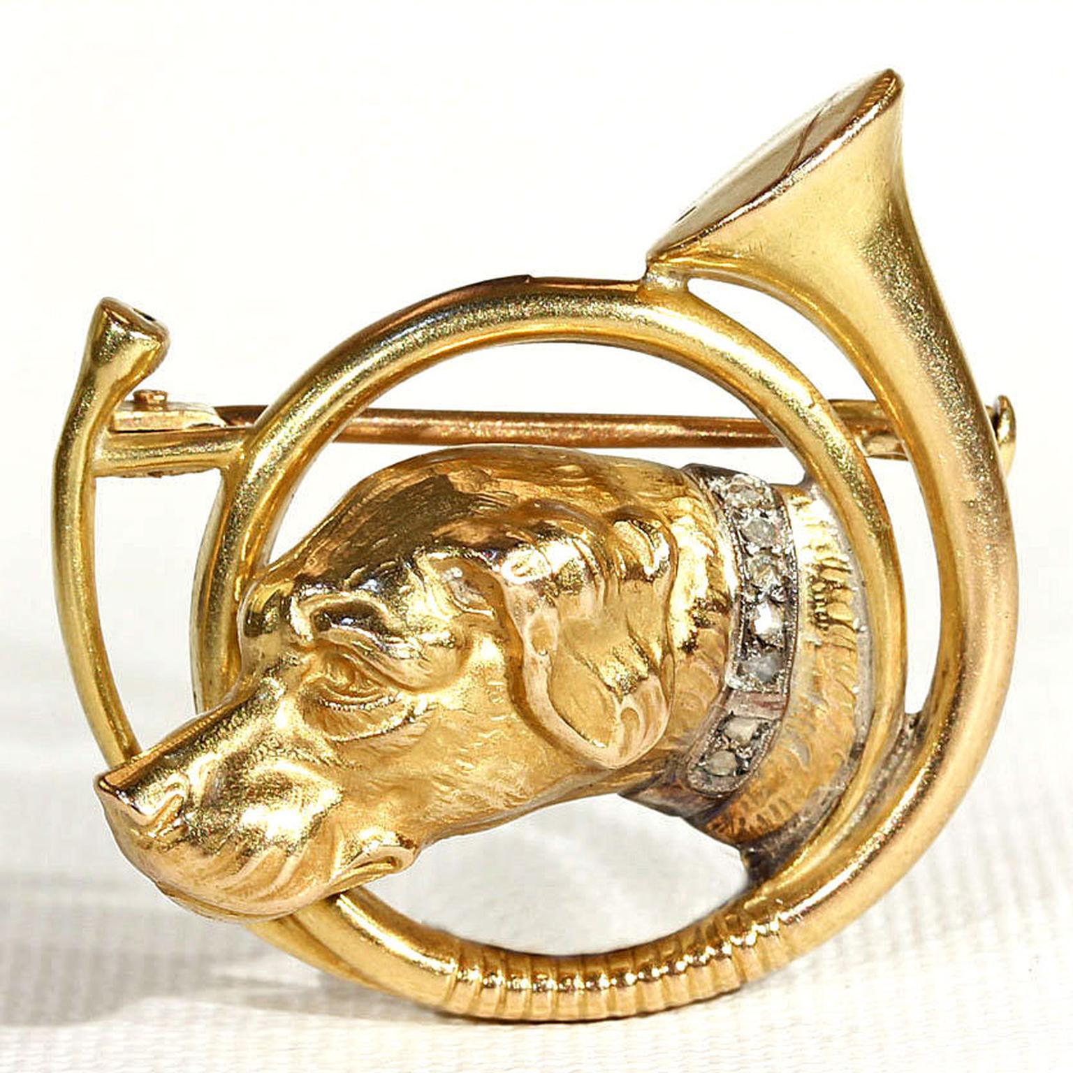 Victoria Sterling 18ct hunting horn and hound brooch