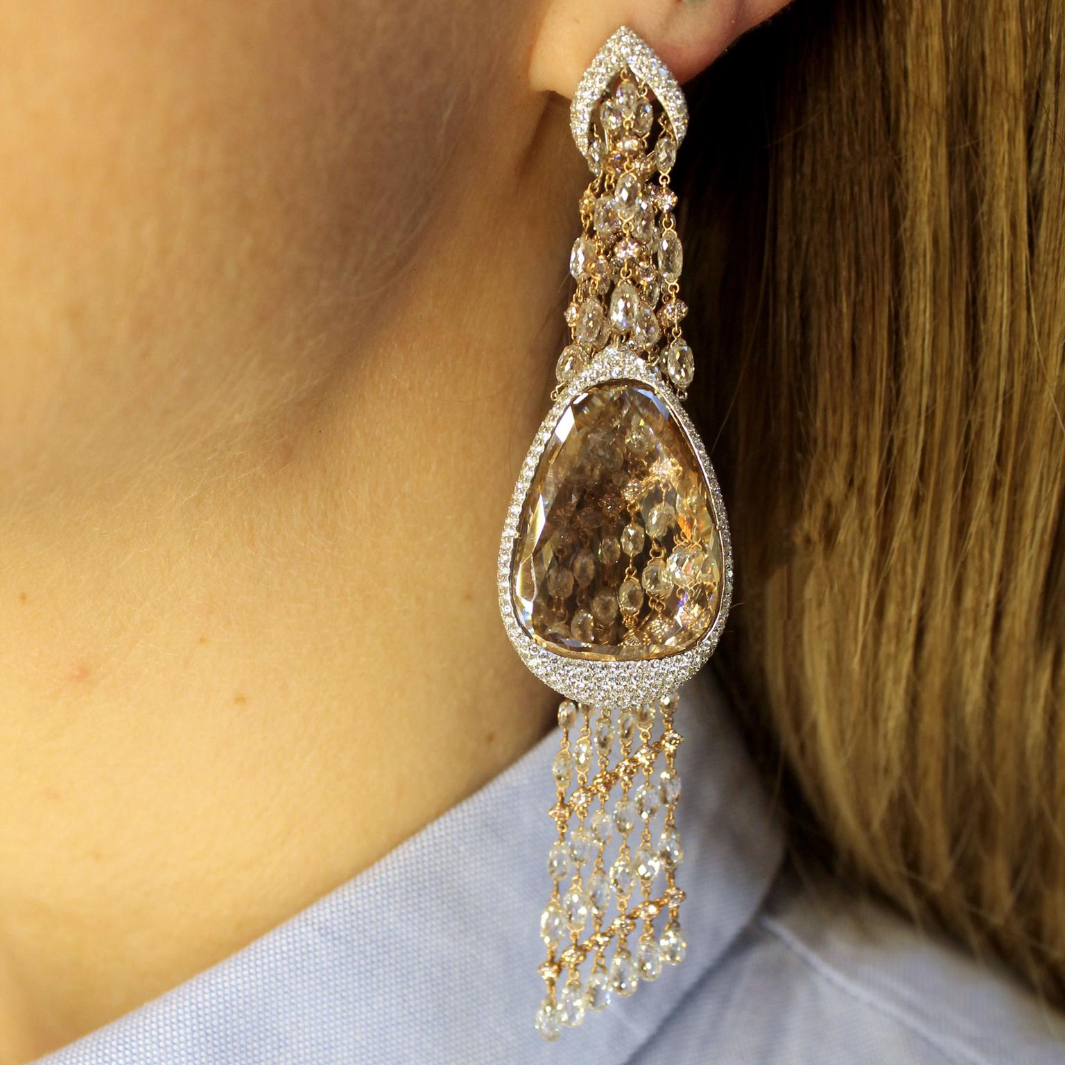 Moussaieff portrait diamond chandelier earrings on model