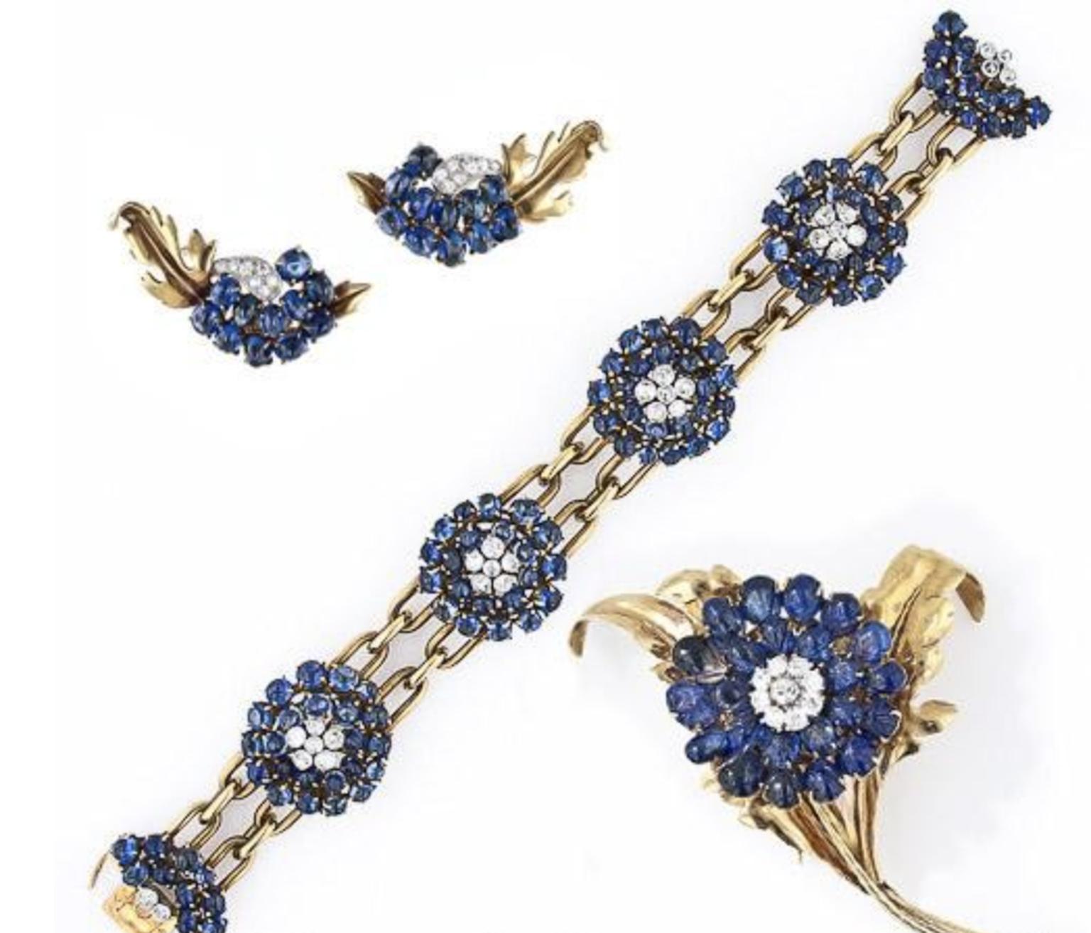 Chaulmet sapphire pin, bracelet and earrings suite sold by Lang Antiques