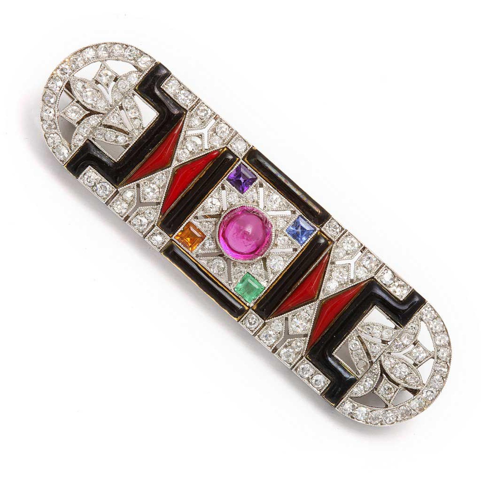 A La Vieille Russie diamond and black onyx brooch