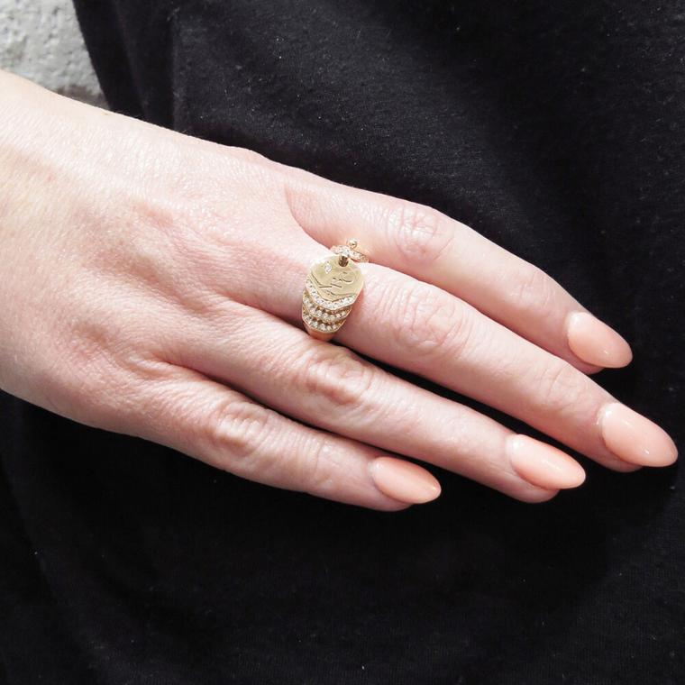 Nouvel Heritage rose gold signet ring on model
