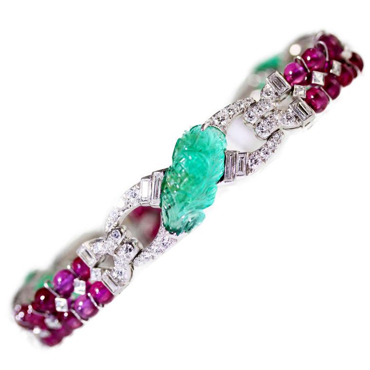 JS Fearnley Art Deco ruby, diamond and carved emerald bracelet