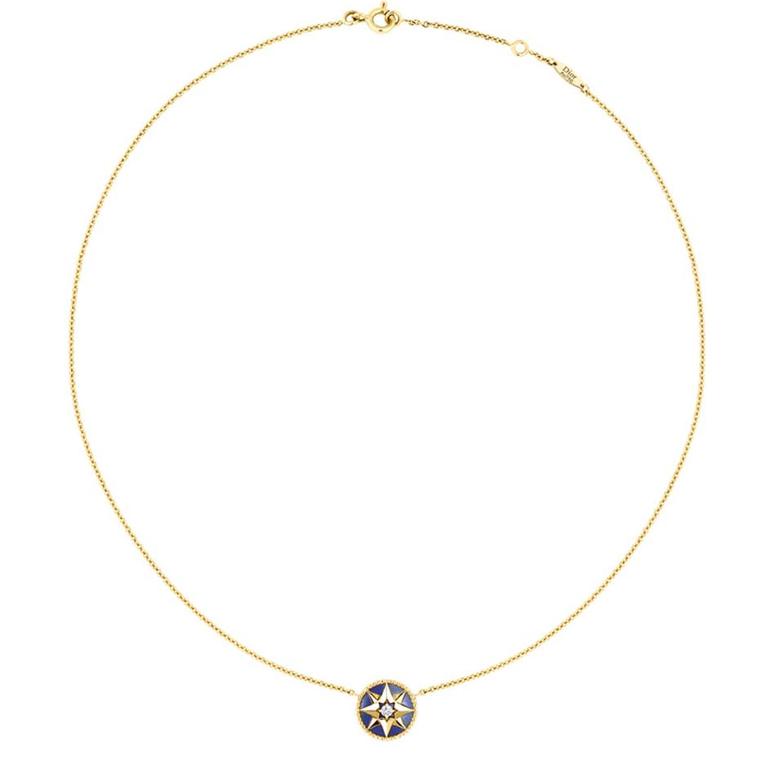 The motif that appears on this yellow gold, lapis lazuli and diamond Rose des Vents necklace is inspired by Christian Dior's travels around the world but also by the star that was his lucky charm and his favourite flower, the rose.