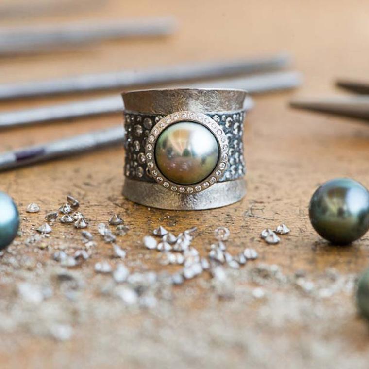 One of Todd Reed's new Tahitian pearl rings on the work bench at his newly expanded studio in Boulder, Colorado