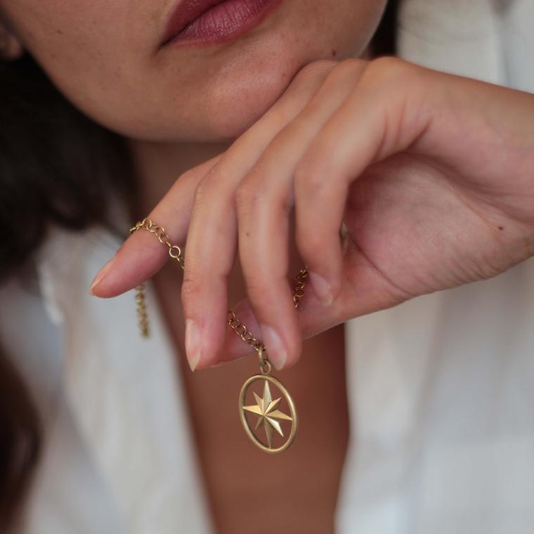 The Shanti Compass amulet by Shakti Ellewood on model