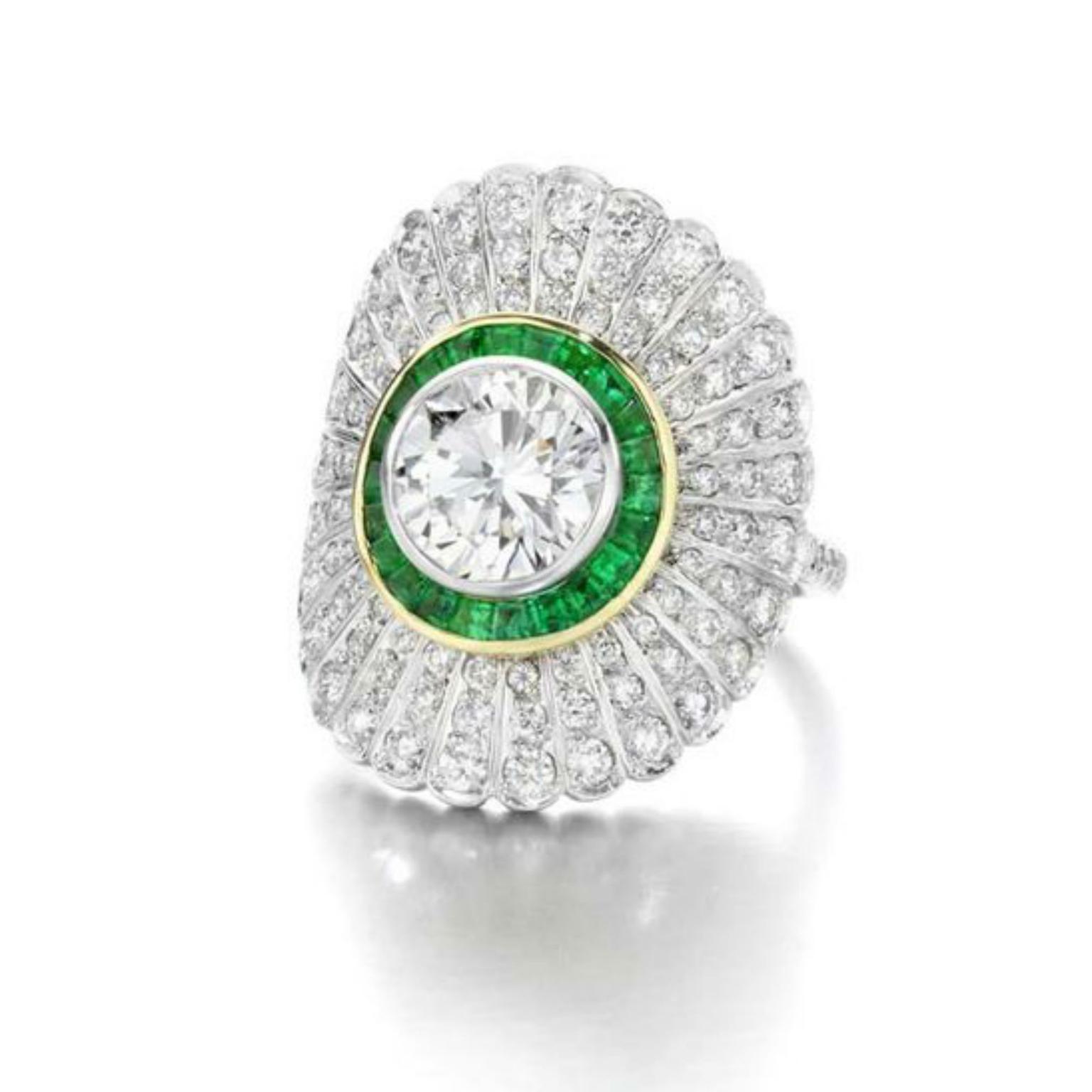 Jessica McCormack diamond and emerald ring