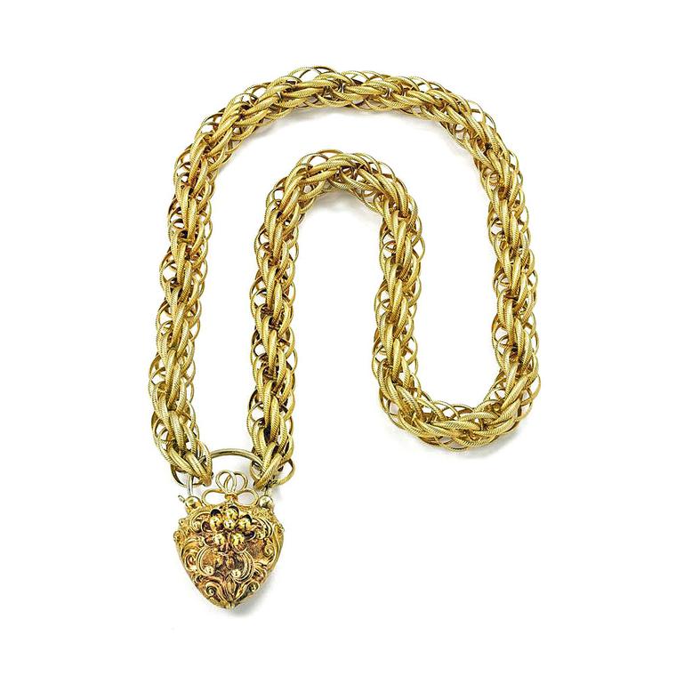 Bentley and Skinner gold chain with heart locket