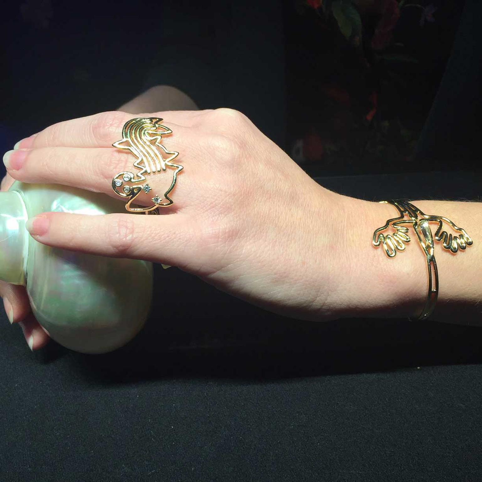 Lydia Courteille Nazca fish ring and lizard bracelet