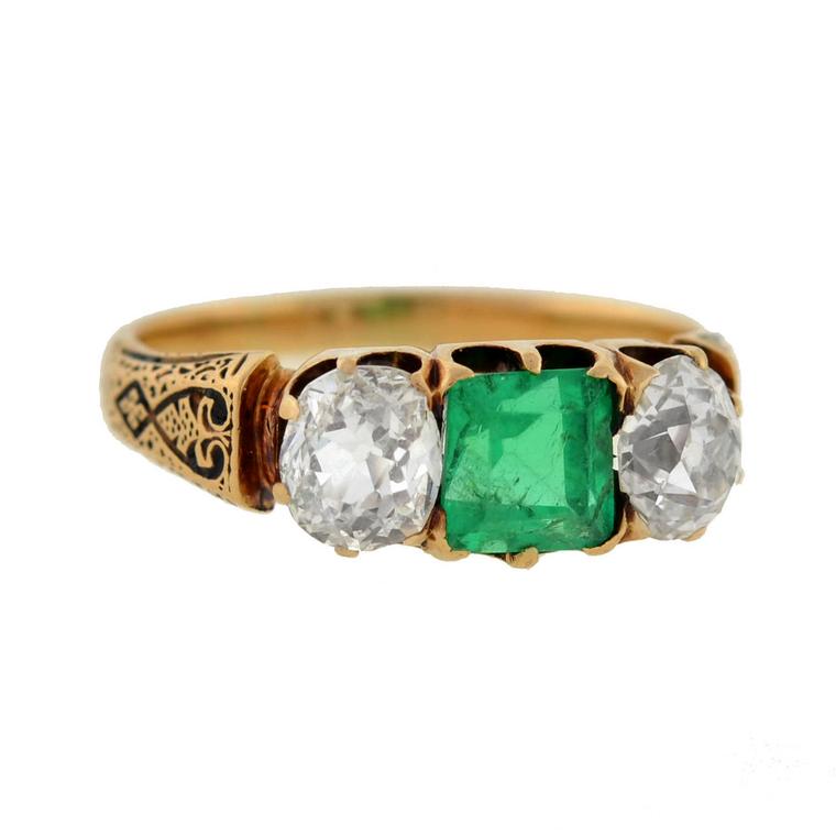 A. Brandt + Son three-stone emerald and old mine-cut diamond ring