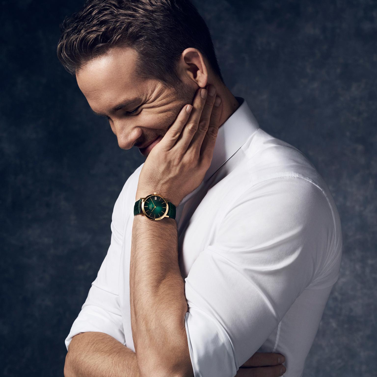 International brand ambassador Ryan Reynolds wears a Piaget Altiplano watch with a green dial